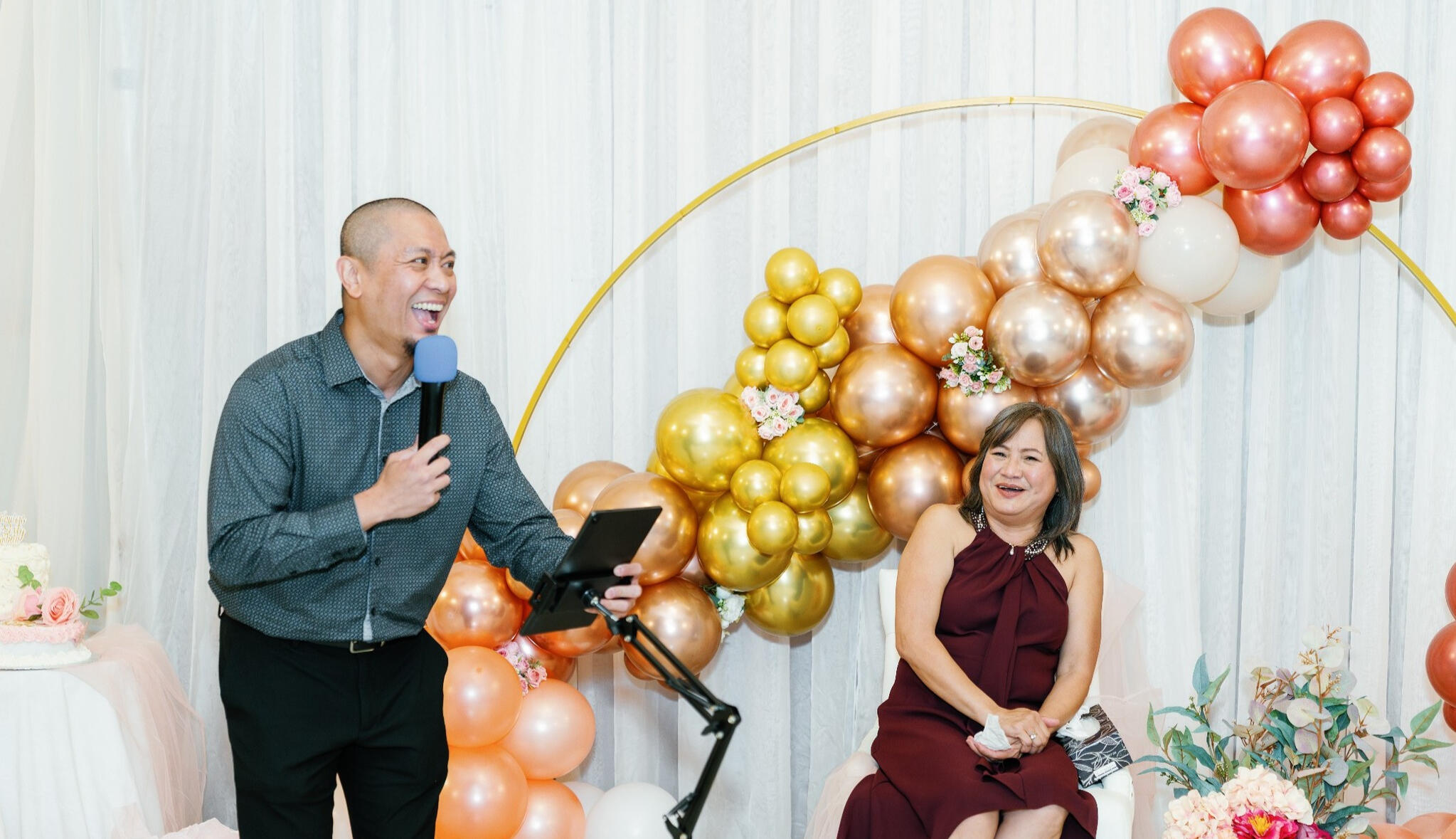 Edmonton event host laughing with birthday celebrant