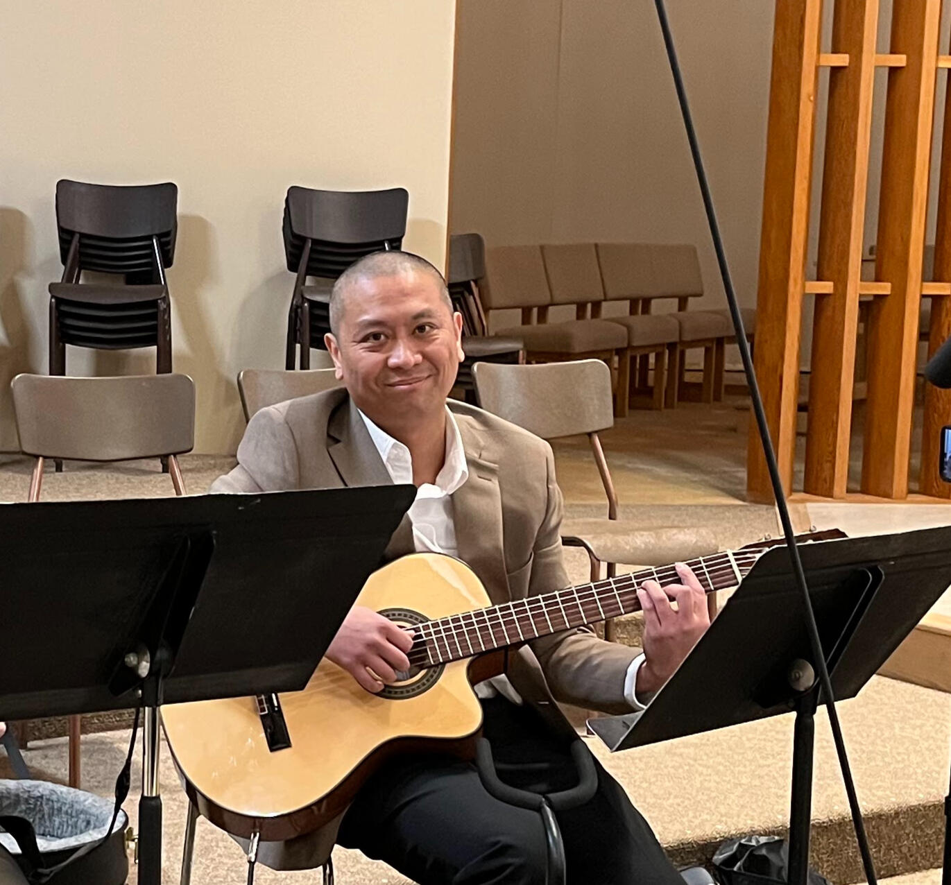 Papa Jedder providing wedding march and ceremony music with a classical guitar